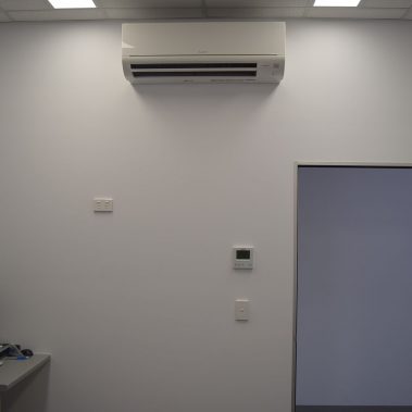 Wall with air conditioning unit